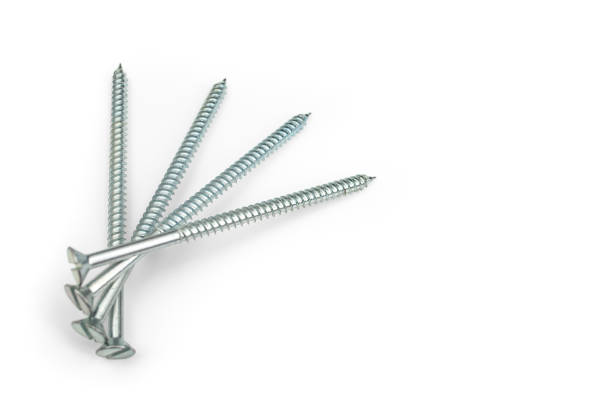 Four long screw bolt nails arranged like a fan, isolated on white