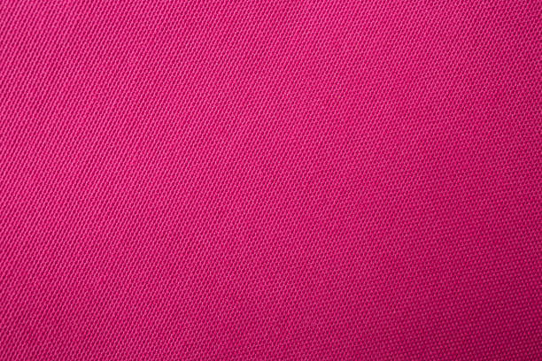 istock Close up of magenta clean canvas, seamless pattern fabric texture close up, template backdrop 1804222986