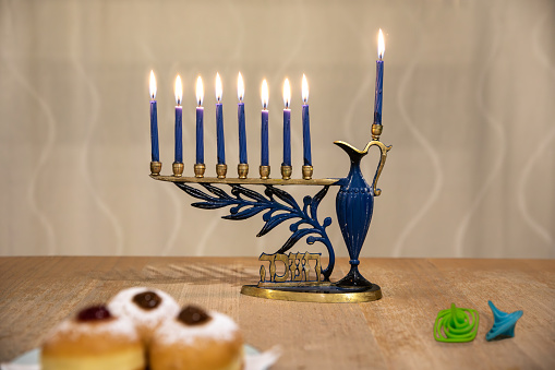 A Jewish seven-pointed candlestick with the star of David, used during the Hanukkah festival, isolated on a white background with a clipping path.