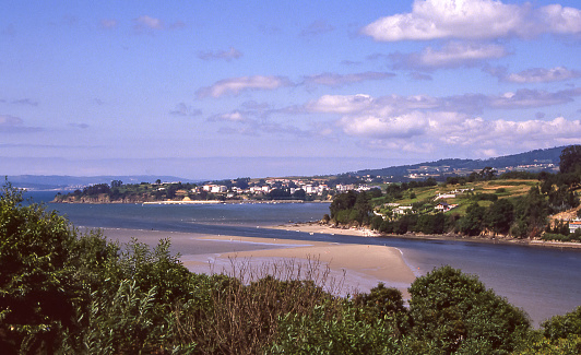 O Barqueiro, Galicia, Spain - aug 1, 1993: view of the sandbanks that emerge during low tide in O Barqueiro, Galicia, Spain