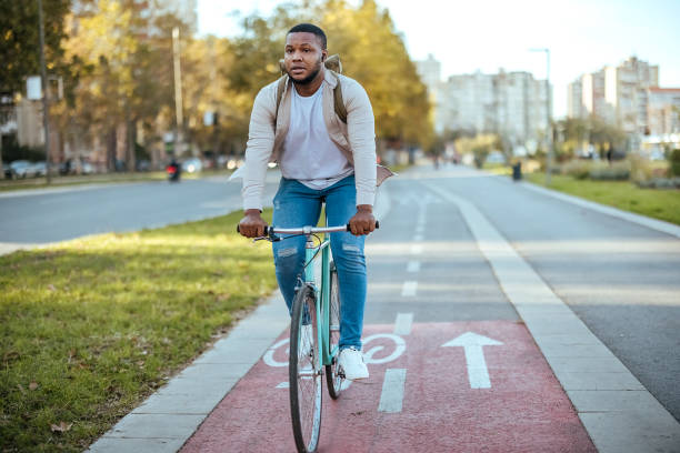 istock Cyclist in city traffic using the bicycle lane 1804255213