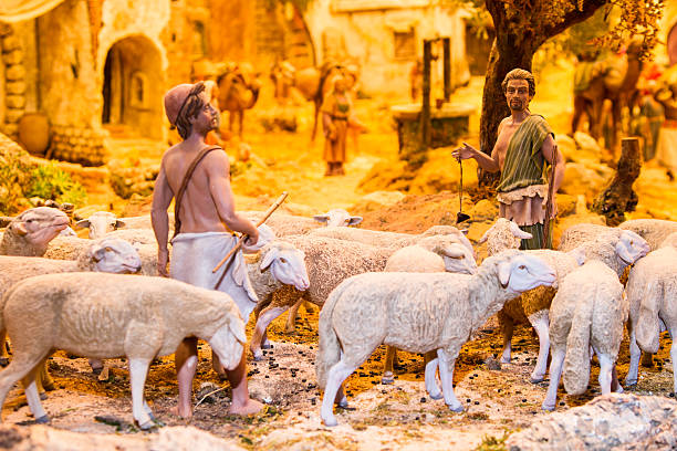 Shepherds with a herd of sheep stock photo