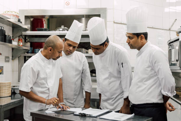 istock Professional chefs in a commercial kitchen of a fine dining restaurant 1804286394