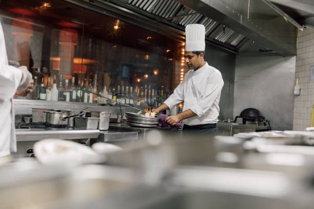 istock Professional chefs in a commercial kitchen of a fine dining restaurant 1804290088