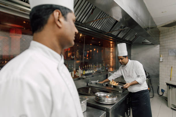 istock Professional chefs in a commercial kitchen of a fine dining restaurant 1804290570