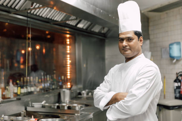 istock Professional chef in a commercial kitchen of a fine dining restaurant 1804296436