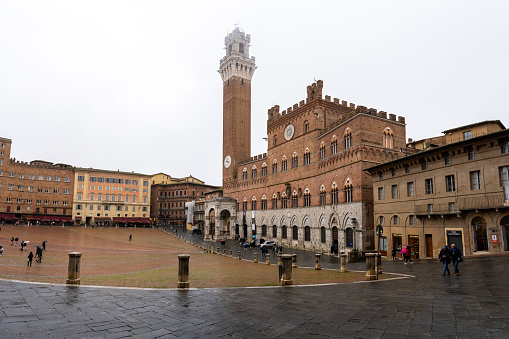Siena, Italy, 12 november 2023 - Palazzo Pubblico (Pubblico Palace) at the famous Piazza del Campo
