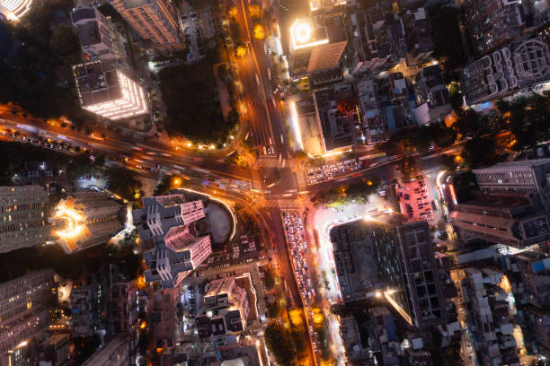 istock Aerial shot of traffic flow at intersection at night 1804307069