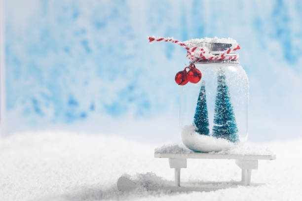 istock Christmas ornaments on snow 1804320487