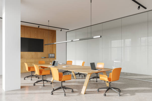 istock Modern office room interior with armchairs and board, drawer with documents 1804322857