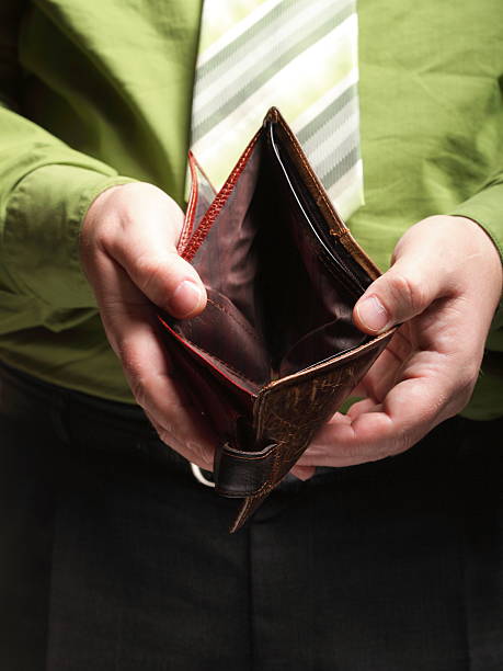 istock Empty wallet in male hands - poor economy 180432427