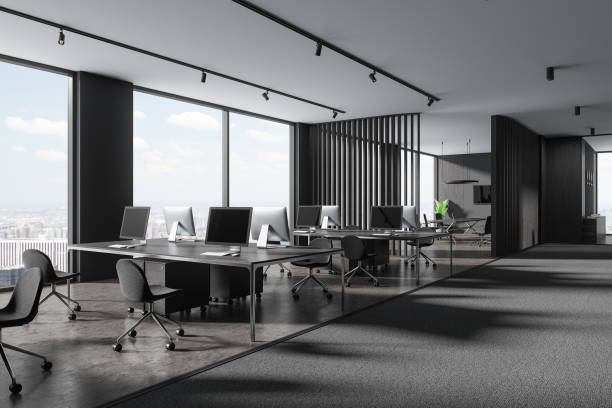 istock Stylish grey office interior with coworking and meeting corner, panoramic window 1804325579