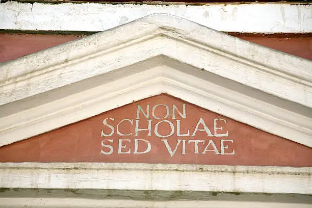 "Non scholae sed vitae" Latin motto written on school house portico