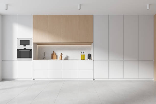 istock White and wooden kitchen interior with cabinets 1804336325