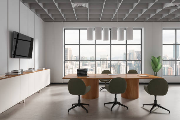 istock Modern business room interior with meeting table and seats, panoramic window 1804339017