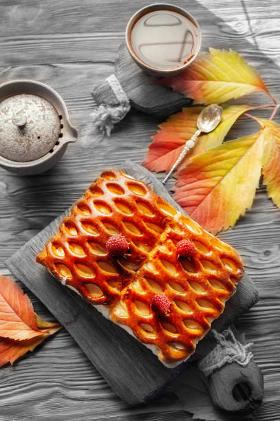 Traditional pastry pie with berries top view. wicker homemade pie is lying on a rustic table. cake for Thanksgiving