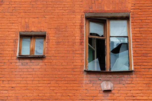 istock facade of an abandoned red brick house. 1804364645