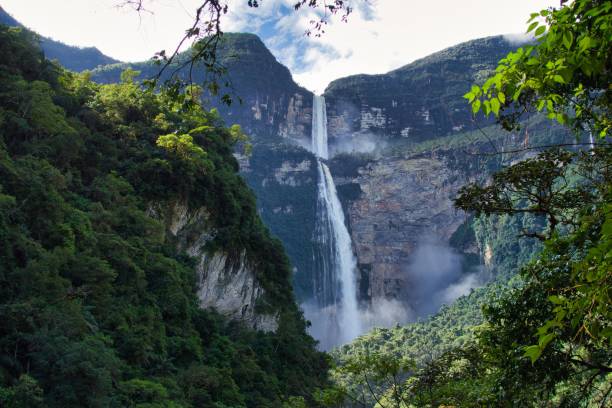 istock majestic Gocta Falls cascading down from a rocky mountain peak, surrounded by lush greenery 1804364787
