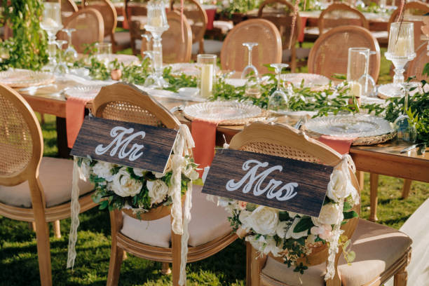 istock Bride and Groom Chair at Wedding Reception 1804385450