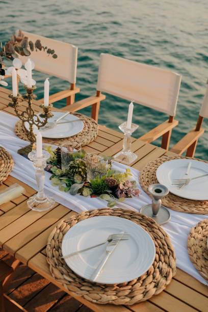 istock image of a wedding celebration table by the sea 1804388615