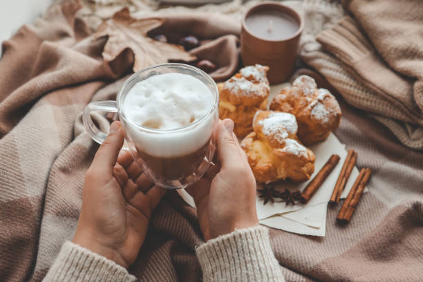 istock Cup of coffee in hands, cozy autumn 1804403549
