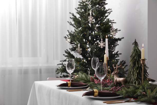 istock Beautiful table setting with Christmas decor in room, space for text 1804412193