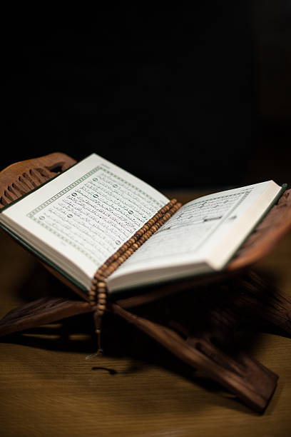 istock Holy Quran on top of the reading table 180441278