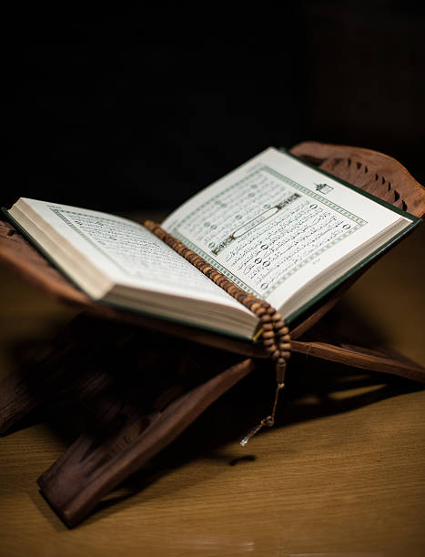 istock Holy Quran on top of the reading table 180441346