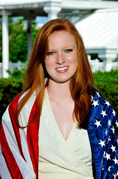 istock Woman Wrapped in a Flag 180441462