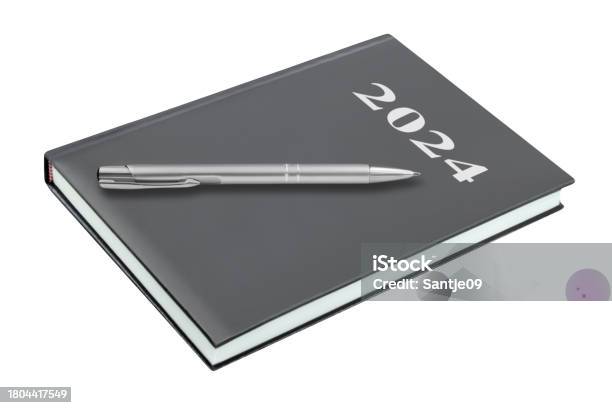 Calendar Book 2024 And Pencil Isolated On White Background Stock Photo - Download Image Now