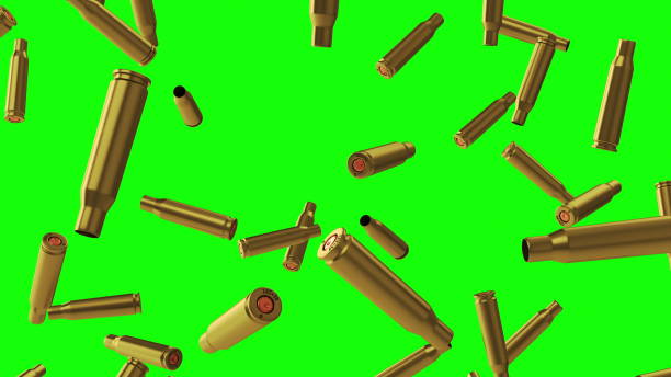 istock Falling spent cartridge cases from automatic weapons on a green background. 1804419173