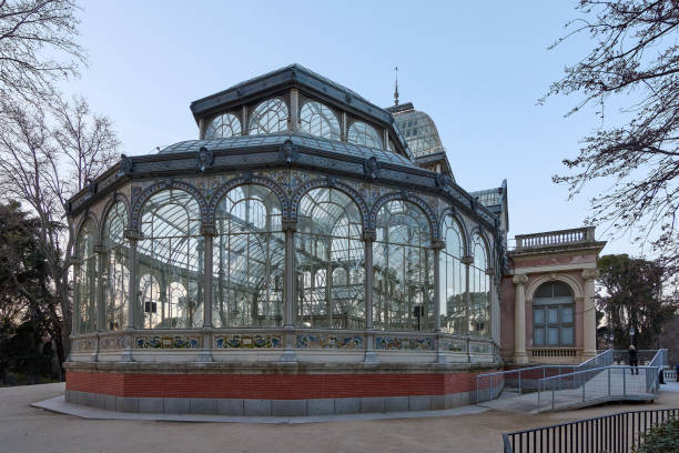 istock Victorian glass pavilion in Retiro Park at sunset 1804419186