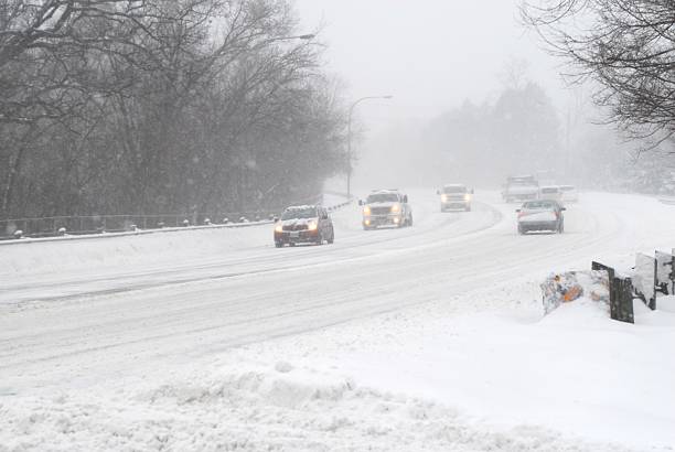 istock Cars in snowstorm 180442634