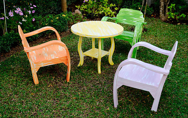 istock The three wood chairs with armrest and yellow round table 180442748