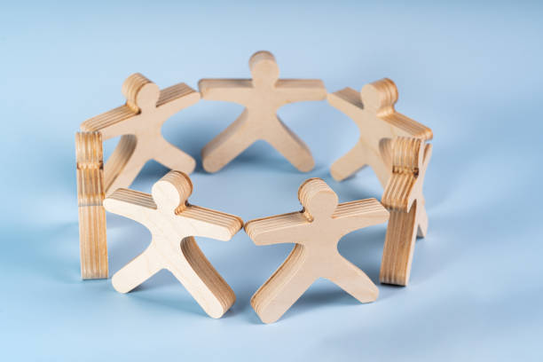 istock Mockup business community working people holding hands together, leadership concept, copyspace information 1804427788