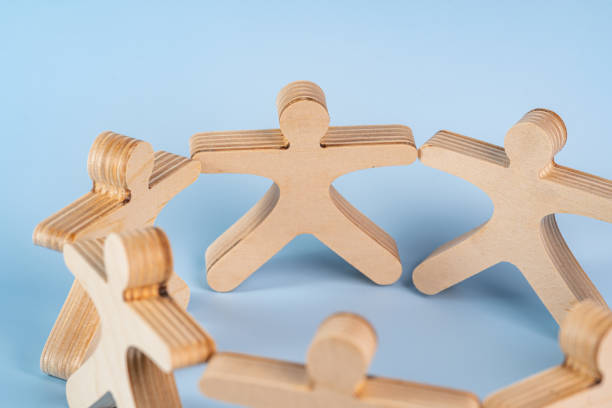 istock Mockup business community working people holding hands together, leadership concept, copyspace information 1804427790