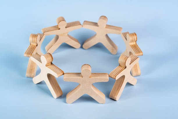 istock Mockup business community working people holding hands together, leadership concept, copyspace information 1804427791