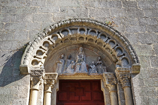 Polychrome tympanum of the church of San Fiz de Solovio (1316), depicting the Adoration of the Magi in relief Santiago de Compostela, Galicia, Spain 10092023