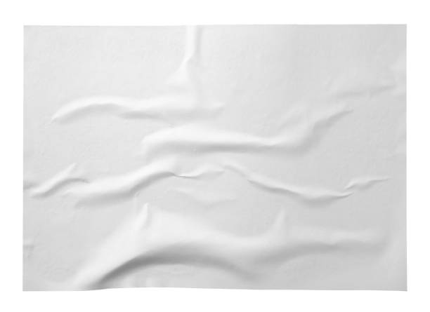 istock Blank creased paper poster isolated on white, top view 1804453681