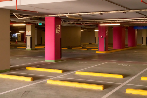 interior of underground parking in a high-rise building