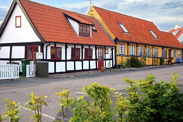 Typical timber framing colorful old house in Gudhjem, Bornholm Island, Denmark