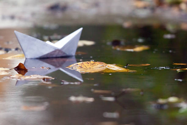 istock Paper toy boat 180448925