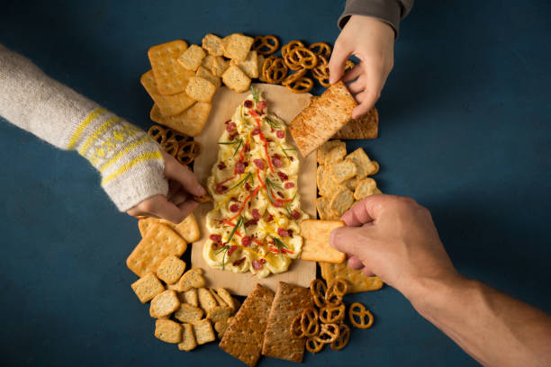 People take cookies and butter, top view