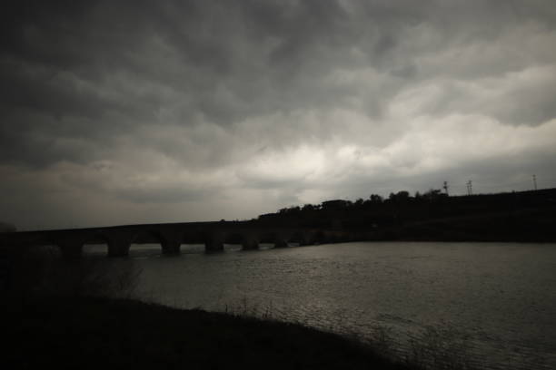 istock historical bridge and the river flowing under it 1804509527