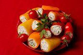 Small paprikas stuffed with cheese, garlic and herbs