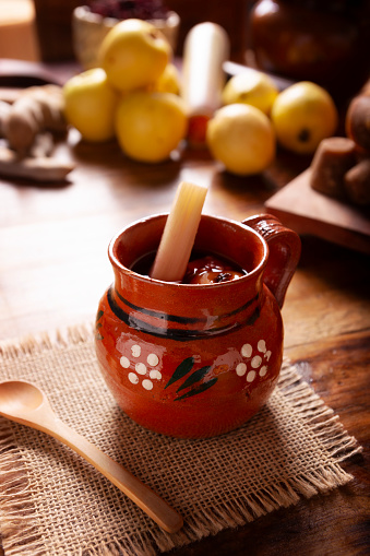 Mexican Ponche. Christmas fruit punch is a hot fruit-infused drink, traditionally consumed in the winter season during posadas and Christmas Eve. Made with sugar cane, piloncillo and fruits.