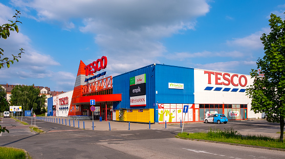 Warsaw, Poland - July 11, 2021: Tesco Kabaty hypermarket redeveloped later to residential project Rytm by Echo Investment in Ursynow district of Warsaw
