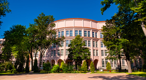 Warsaw, Poland - June 22, 2021: Warsaw School of Economics SGH business school main historic building at Aleja Niepodleglosci street in Mokotow district of Warsaw