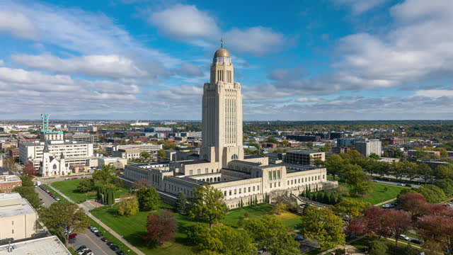 Aerial Hyper Lapse of Nebraska State Capitol on a Cloudy Day in Fall