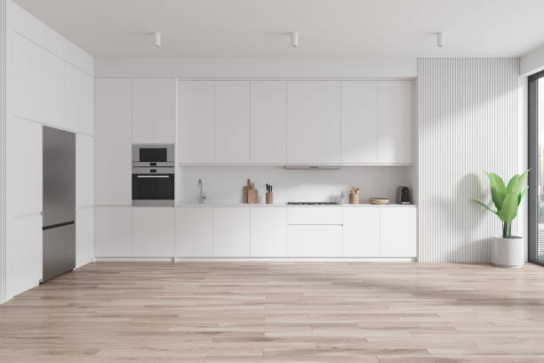 istock Stylish home kitchen interior with cooking room, fridge and panoramic window 1804564864